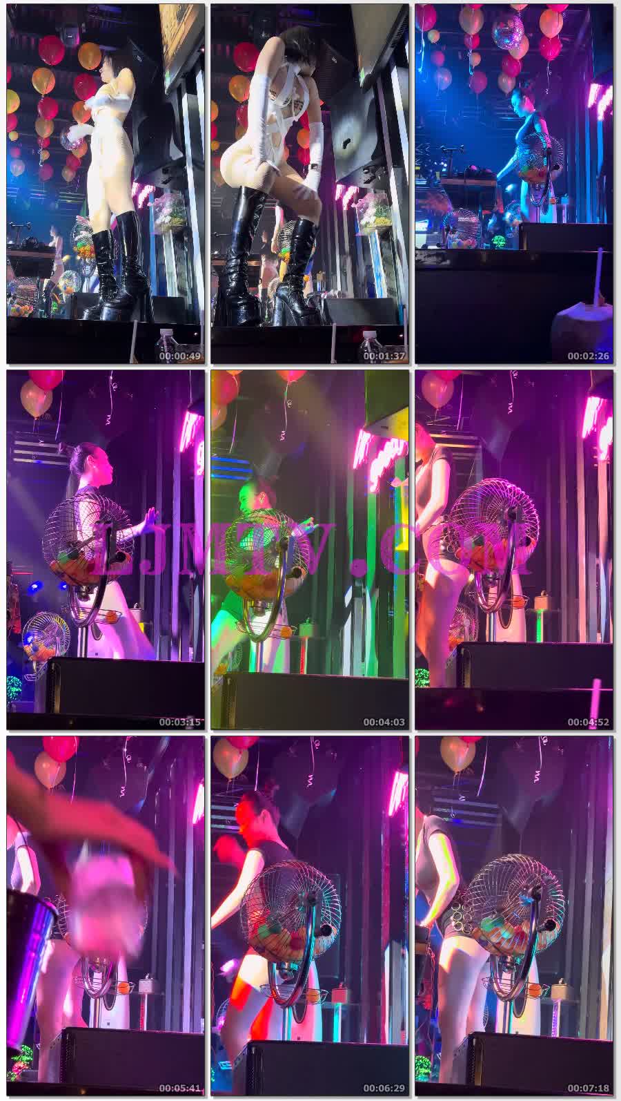 低角度拍摄白色绑带演出服的红唇好身材黑色皮靴辣女-4K视频